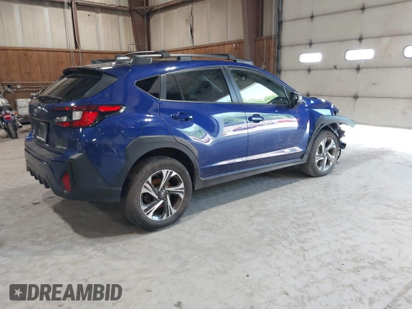 2024 Subaru Crosstrek Premium z VIN JF2GUADC3R8318644, wystawiony jako IAAI lot #42558586 z przebiegiem 33 648 mil mil oraz . Historia ofert i sprzedaży dostępna na DreamBid. Obrazek 4.