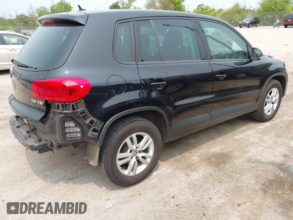 2013 Volkswagen Tiguan S with VIN WVGAV3AX2DW594334, listed as a IAAI auction lot 42405989 with 96,559 mi miles and . Bid and sale history available at DreamBid. Image 4.