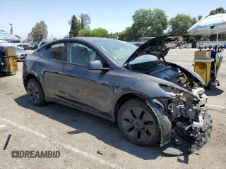 2024 Tesla Model Y с VIN 7SAYGDED5RF177307, выставлен на аукционе Copart как лот 57170315 с пробегом 14 726 миль миль и Списание • Salvage title. История ставок и продаж доступна на DreamBid. Изображение 4.