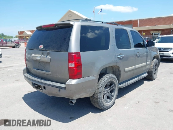 2008 Chevrolet Tahoe 1LT with VIN 1GNFC13008R259055, listed as a IAAI auction lot 42515431 with 277,877 mi miles and . Bid and sale history available at DreamBid. Image 4.