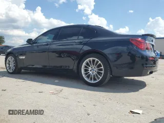 2014 BMW 7 Series 750i xDrive with VIN WBAYB6C53ED225212, listed as a Copart auction lot 71866424 with 122,567 mi miles and Salvage Title. Bid and sale history available at carsss.com. Image 2.