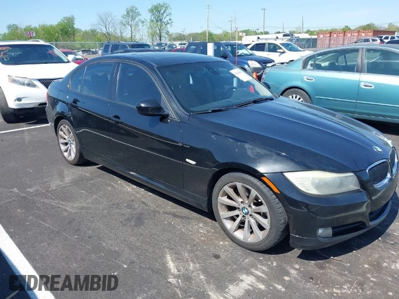 2011 BMW 3 Series 328i with VIN WBAPH7G50BNM56021, listed as a IAAI auction lot 42006563 with 178,919 mi miles. Bid and sale history available at carsss.com. Image 1.