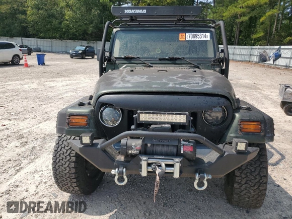 1997 Jeep Wrangler Sport with VIN 1J4FY19S8VP522719, listed as a Copart auction lot 70895314 with 174,536 mi miles and Clean Title. Bid and sale history available at carsss.com. Image 5.