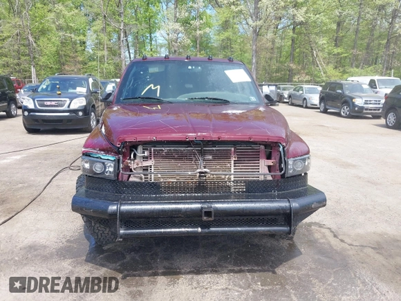 2002 Dodge 2500 z VIN 3B7KF23C92M244271, wystawiony jako IAAI lot #42104621 z przebiegiem 179 986 mil mil oraz . Historia ofert i sprzedaży dostępna na DreamBid. Obrazek 12.