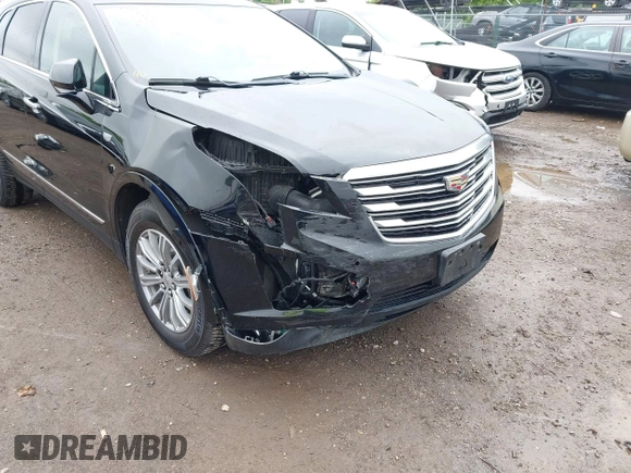 2017 Cadillac XT5 Luxury AWD with VIN 1GYKNDRS9HZ149675, listed as a IAAI auction lot 42329454 with 77,257 mi miles and . Bid and sale history available at DreamBid. Image 6.