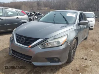 2018 Nissan Altima SR with VIN 1N4AL3AP1JC115513, listed as a IAAI auction lot 41939090 with 118,215 mi miles and . Bid and sale history available at DreamBid. Image 18.