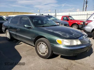1998 Lincoln Continental with VIN 1LNFM97V8WY707809, listed as a Copart auction lot 70842654 with 175,066 mi miles and Salvage Title. Bid and sale history available at carsss.com. Image 4.
