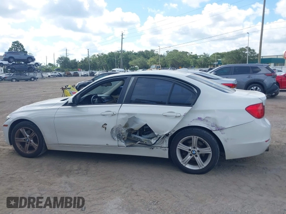 2015 BMW 3 Series 320i xDrive with VIN WBA3C3C58FK201748, listed as a IAAI auction lot 42678404 with 115,043 mi miles and . Bid and sale history available at DreamBid. Image 14.