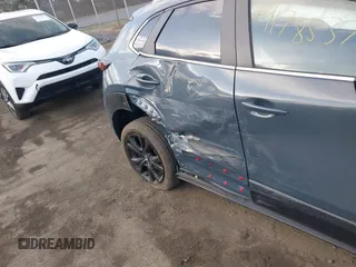 2023 Mazda CX-30 S Carbon Edition with VIN 3MVDMBCM1PM573317, listed as a IAAI auction lot 41785371 with 6,475 mi miles and . Bid and sale history available at DreamBid. Image 6.