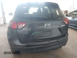 2014 Mazda CX-5 Sport with VIN JM3KE4BE5E0375360, listed as a IAAI auction lot 41788977 with 135,487 mi miles. Bid and sale history available at carsss.com. Image 16.
