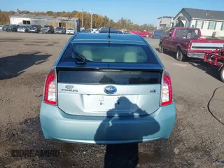 2015 Toyota Prius Four with VIN JTDKN3DU6F1891116, listed as a IAAI auction lot 40689158 with 210,876 mi miles. Bid and sale history available at carsss.com. Image 17.