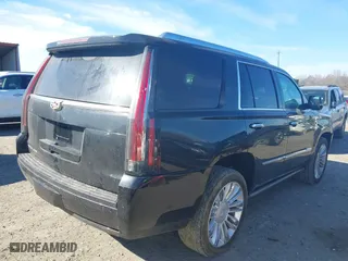 2016 Cadillac Escalade Platinum with VIN 1GYS4DKJ3GR217116, listed as a IAAI auction lot 41679348 with 122,811 mi miles. Bid and sale history available at carsss.com. Image 4.