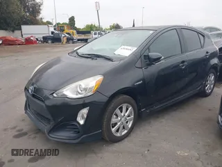 2017 Toyota Prius One with VIN JTDKDTB32H1597017, listed as a IAAI auction lot 42030182 with 56,461 mi miles and . Bid and sale history available at carsss.com. Image 2.