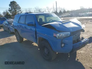 2018 Toyota 4Runner SR5 with VIN JTEBU5JR9J5602869, listed as a IAAI auction lot 41413836 with 163,734 mi miles. Bid and sale history available at carsss.com. Image 1.