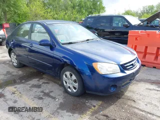 2006 Kia Spectra EX with VIN KNAFE122965293874, listed as a IAAI auction lot 42111219 with 241,644 mi miles. Bid and sale history available at carsss.com. Image 1.