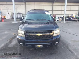 2010 Chevrolet Suburban LTZ with VIN 1GNUKKE37AR188966, listed as a IAAI auction lot 41833988 with 215,922 mi miles. Bid and sale history available at carsss.com. Image 12.