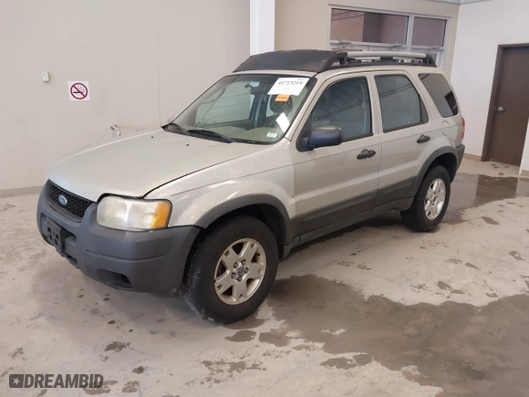 2004 Ford Escape XLT with VIN 1FMYU93164KB05521, listed as a IAAI auction lot 41723219 with 246,369 mi miles. Bid and sale history available at carsss.com. Image 18.