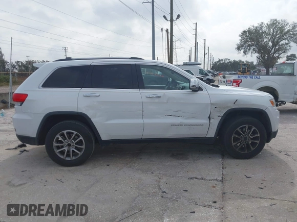 2014 Jeep Grand Cherokee Limited with VIN 1C4RJEBG1EC403972, listed as a IAAI auction lot 41455012 with 241,168 mi miles and . Bid and sale history available at DreamBid. Image 13.