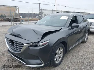 2016 Mazda CX-9 Grand Touring with VIN JM3TCBDY1G0103560, listed as a IAAI auction lot 41344813 with 123,588 mi miles. Bid and sale history available at carsss.com. Image 20.