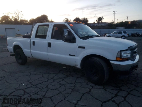 2003 Ford Super Duty F-250 XL with VIN 1FTNW20P43ED09877, listed as a Copart auction lot 82239764 with 227,418 mi miles and Salvage Title. Bid and sale history available at carsss.com. Image 4.