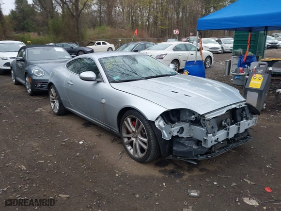 2008 Jaguar XK with VIN SAJWA43C889B21570, listed as a IAAI auction lot 42082547 with 99,783 mi miles. Bid and sale history available at carsss.com. Image 1.