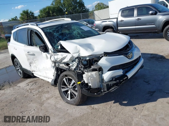 2018 Toyota RAV4 XLE with VIN JTMWFREV8JJ157496, listed as a IAAI auction lot 42249948 with 64,767 mi miles and . Bid and sale history available at DreamBid. Image 1.