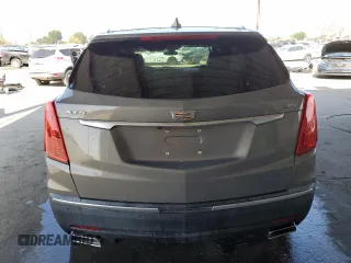 2019 Cadillac XT5 Luxury FWD z VIN 1GYKNCRS4KZ221304, wystawiony jako Copart lot #54995415 z przebiegiem 128 940 mil mil oraz Szkoda całkowita • Salvage title. Historia ofert i sprzedaży dostępna na DreamBid. Obrazek 6.