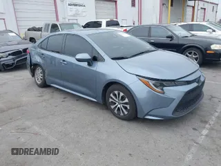 2022 Toyota Corolla Hybrid LE with VIN JTDEAMDE9NJ051580, listed as a IAAI auction lot 41074801 with 55,251 mi miles. Bid and sale history available at carsss.com. Image 1.