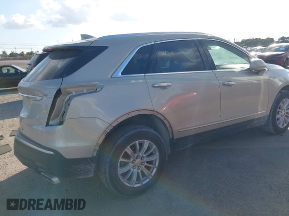 2017 Cadillac XT5 FWD with VIN 1GYKNARS0HZ174625, listed as a IAAI auction lot 41520634 with 116,169 mi miles. Bid and sale history available at carsss.com. Image 4.