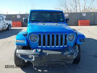 2023 Jeep Wrangler Sahara z VIN 1C4JJXP60PW513969, wystawiony jako IAAI lot #41766631 z przebiegiem 34 819 mil mil oraz . Historia ofert i sprzedaży dostępna na DreamBid. Obrazek 13.
