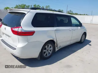 2015 Toyota Sienna XLE with VIN 5TDYK3DCXFS663083, listed as a IAAI auction lot 41967621 with 177,472 mi miles and . Bid and sale history available at DreamBid. Image 4.