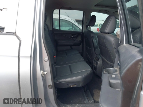 2019 Honda Ridgeline RTL-E with VIN 5FPYK3F73KB006244, listed as a IAAI auction lot 42167460 with 53,498 mi miles and . Bid and sale history available at DreamBid. Image 8.