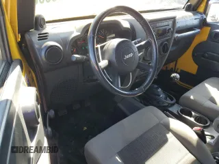 2008 Jeep Wrangler X with VIN 1J4FA24148L555401, listed as a Copart auction lot 50293555 with 155,022 mi miles and Salvage Title. Bid and sale history available at DreamBid. Image 8.