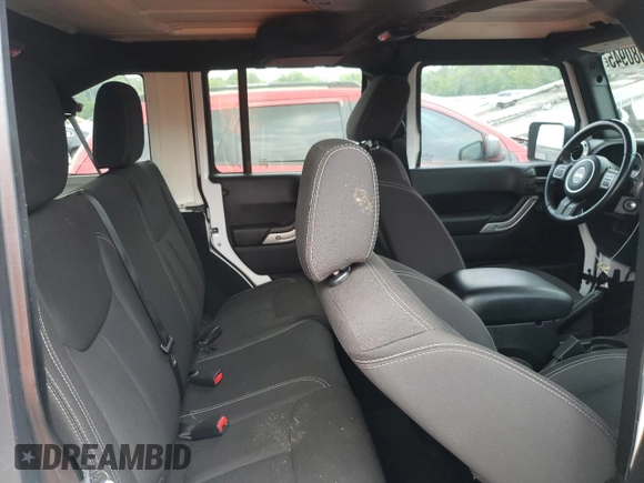 2015 Jeep Wrangler Unlimited Sahara z VIN 1C4BJWEG6FL627890, wystawiony jako Copart lot #58080945 z przebiegiem 145 941 mil mil oraz Szkoda całkowita • Salvage title. Historia ofert i sprzedaży dostępna na DreamBid. Obrazek 10.