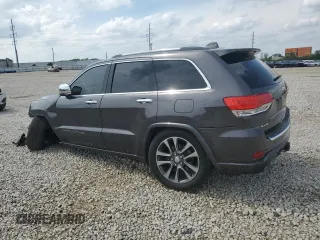 2017 Jeep Grand Cherokee Overland z VIN 1C4RJFCG1HC684826, wystawiony jako Copart lot #59971595 z przebiegiem 101 765 mil mil oraz Szkoda całkowita • Salvage title. Historia ofert i sprzedaży dostępna na DreamBid. Obrazek 2.