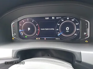2023 Volkswagen Atlas SE z VIN 1V2HE2CA1PC210232, wystawiony jako IAAI lot #40966039 z przebiegiem 4 064 mil mil oraz . Historia ofert i sprzedaży dostępna na DreamBid. Obrazek 7.
