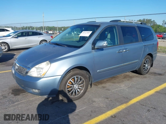 2012 Kia Sedona EX with VIN KNDMH4C71C6423844, listed as a IAAI auction lot 41967401 with 199,067 mi miles. Bid and sale history available at carsss.com. Image 2.