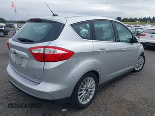 2014 Ford C-Max SEL z VIN 1FADP5BU7EL511677, wystawiony jako IAAI lot #40554962 z przebiegiem 63 031 mil mil oraz . Historia ofert i sprzedaży dostępna na DreamBid. Obrazek 4.