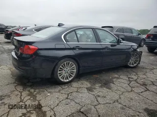 2014 BMW 3 Series 328i with VIN WBA3C1C5XEK105543, listed as a Copart auction lot 58548015 with 156,721 mi miles and Salvage title. Bid and sale history available at DreamBid. Image 3.