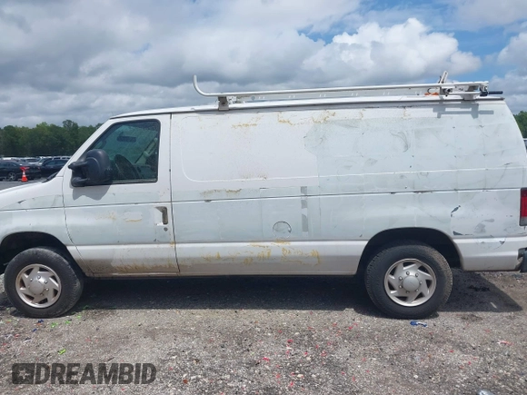2012 Ford Econoline Cargo Commercial with VIN 1FTNE1EW9CDA86738, listed as a IAAI auction lot 42464315 with 180,322 mi miles and . Bid and sale history available at DreamBid. Image 14.