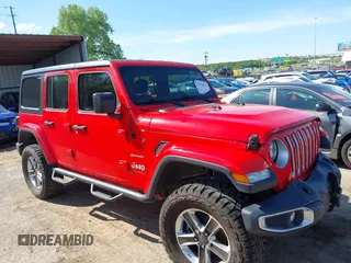 2019 Jeep Wrangler Unlimited Sahara with VIN 1C4HJXEG7KW551864, listed as a IAAI auction lot 42170875 with 115,695 mi miles and . Bid and sale history available at DreamBid. Image 12.