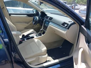 2013 Volkswagen Passat SE z VIN 1VWBP7A37DC111202, wystawiony jako IAAI lot #42395659 z przebiegiem 138 783 mil mil oraz . Historia ofert i sprzedaży dostępna na DreamBid. Obrazek 5.