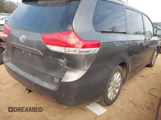 2013 Toyota Sienna XLE with VIN 5TDDK3DC6DS054942, listed as a IAAI auction lot 41172005 with 202,675 mi miles and . Bid and sale history available at DreamBid. Image 4.
