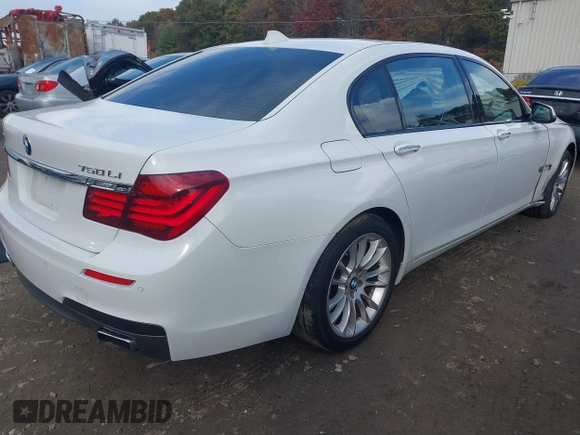 2015 BMW 7 Series 750Li xDrive with VIN WBAYF8C56FD654765, listed as a IAAI auction lot 40734550 with 133,848 mi miles and . Bid and sale history available at carsss.com. Image 4.