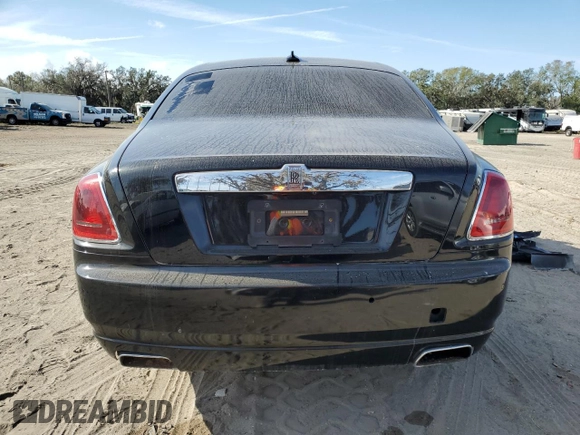 2012 Rolls-Royce Ghost z VIN SCA664S57CUX50671, wystawiony jako Copart lot #84172874 z przebiegiem Nie podano mil oraz Szkody całkowita. Historia ofert i sprzedaży dostępna na DreamBid. Obrazek 6.