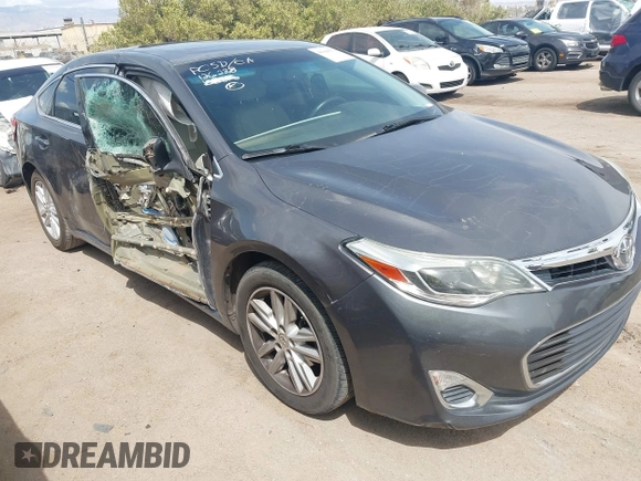 2014 Toyota Avalon Limited with VIN 4T1BK1EB1EU101787, listed as a IAAI auction lot 41949977 with 137,837 mi miles. Bid and sale history available at carsss.com. Image 1.