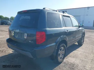 2003 Honda Pilot EX with VIN 2HKYF18533H612563, listed as a IAAI auction lot 41986321 with 259,252 mi miles. Bid and sale history available at carsss.com. Image 4.