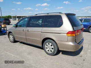 2004 Honda Odyssey EX z VIN 5FNRL18674B007645, wystawiony jako Copart lot #56797535 z przebiegiem 243 256 mil mil oraz Szkoda całkowita • Salvage title. Historia ofert i sprzedaży dostępna na DreamBid. Obrazek 2.