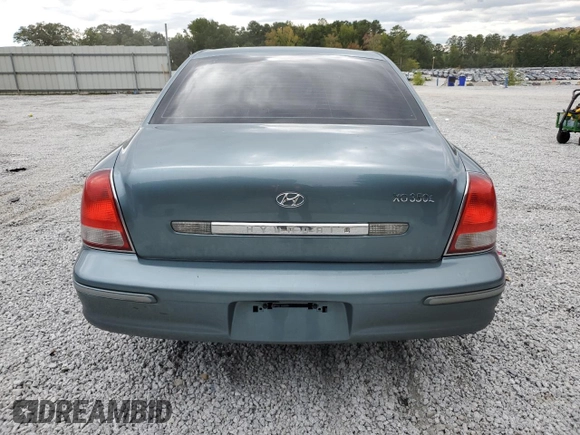 2003 Hyundai XG z VIN KMHFU45E03A262296, wystawiony jako Copart lot #67608394 z przebiegiem 116 296 mil mil oraz Szkoda całkowita • Salvage title. Historia ofert i sprzedaży dostępna na DreamBid. Obrazek 6.