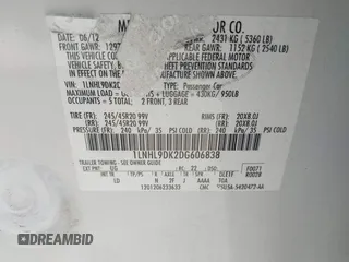 2013 Lincoln MKS with VIN 1LNHL9DK2DG606838, listed as a IAAI auction lot 42454441 with 163,475 mi miles and . Bid and sale history available at DreamBid. Image 9.